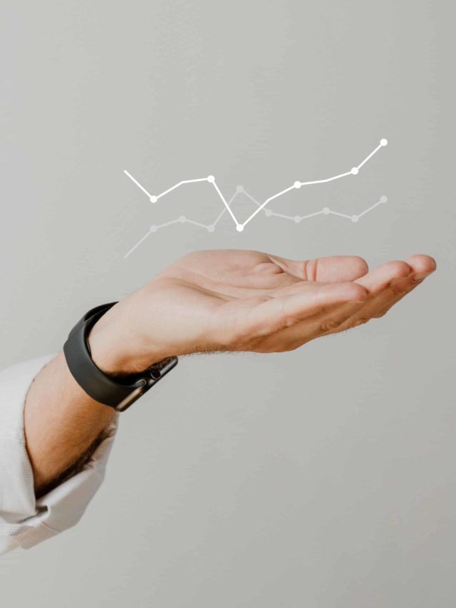 cropped-digital-graph-performance-with-businessman-hand-overlay-scaled-1.jpg