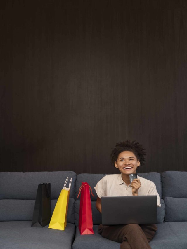 cropped young woman doing shopping online