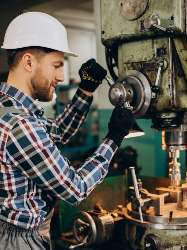 cropped-workman-wearing-hard-hat-working-with-metal-constructions-at-factory-2-.jpg