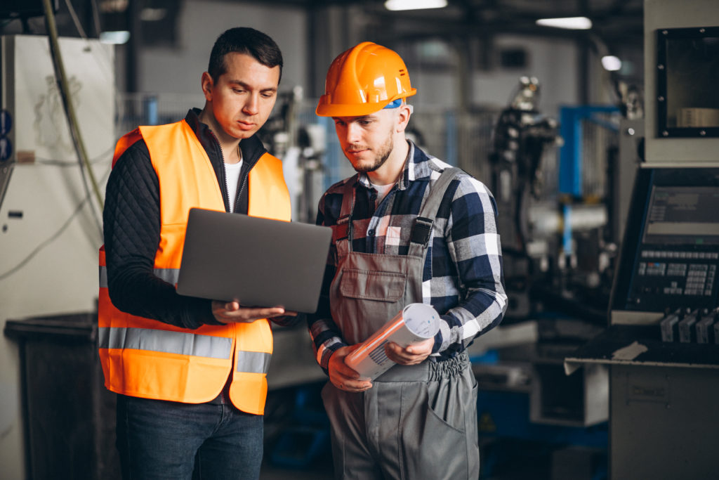 two colleagues at a factory