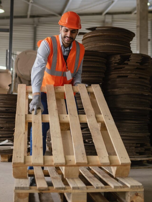 man-working-with-heavy-wooden-materials