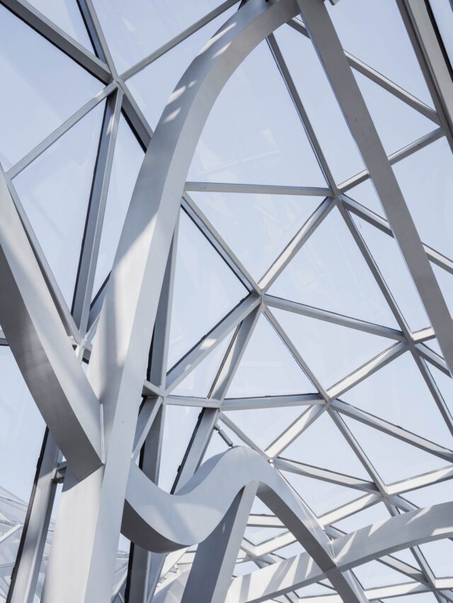 Vertical low angle shot of the ceiling of a white geometrical buildings