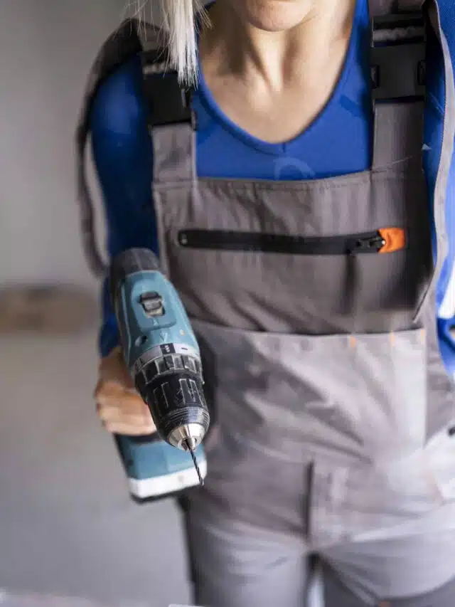 front-view-construction-worker-with-drill