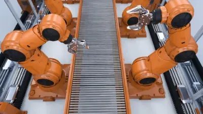 robos industriais manipulando objetos em producao