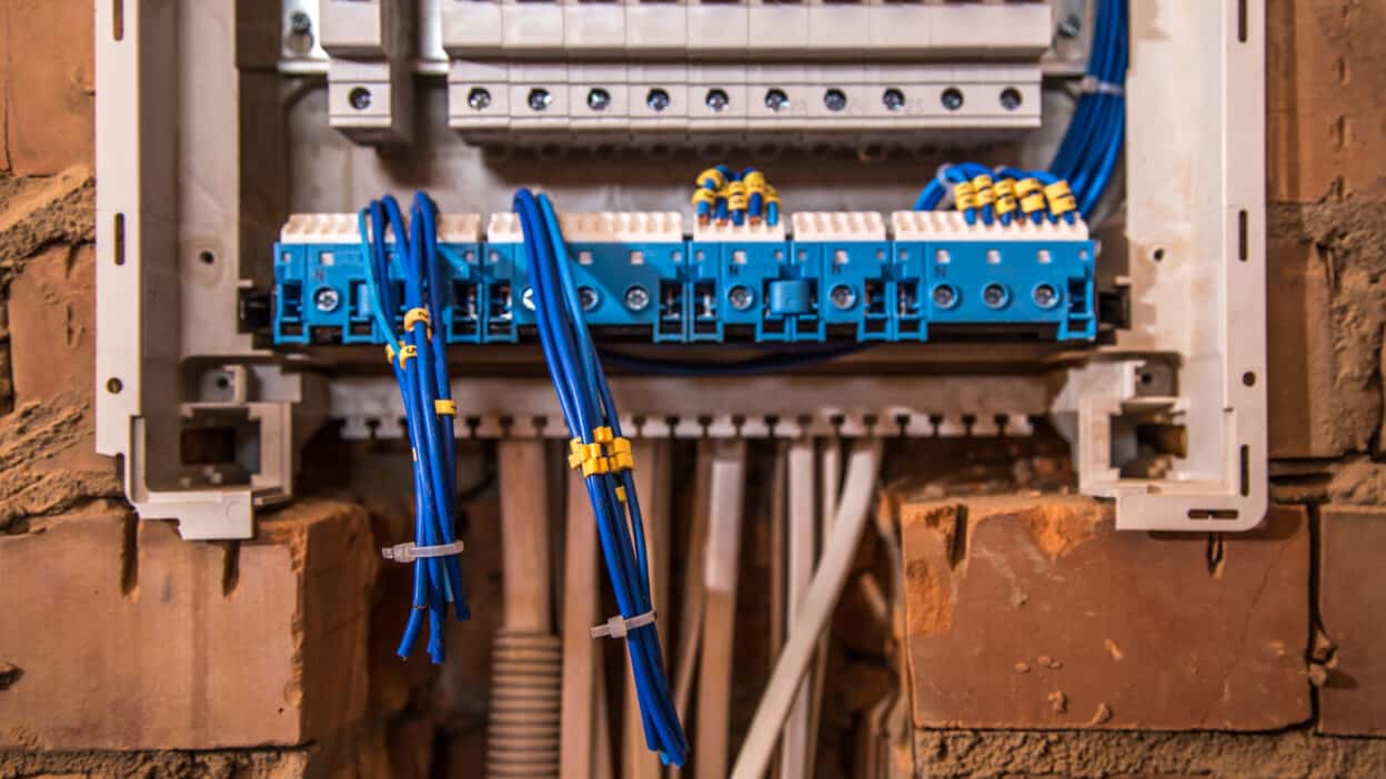 assembly electrical panel electrician job robot with wires circuit breakers